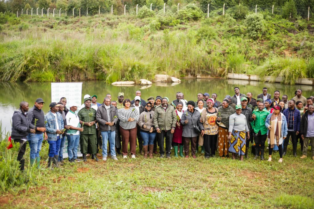 Stakeholders visiting a fish farming water source